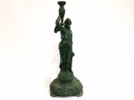 Antiga castiçal italiano confeccionado em petit bronze do Séc. XIX patinado na cor verde representando "Ninfa". Med.: 38 cm. Obs.: apresenta marcas do tempo, pequenas perdas de pigmentos.