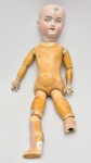 COLECIONISMO - Antiga boneca de coleção confeccionada em passa, alemã, apresentando marca na "nuca". Med.: 50 cm. Obs.: no estado.