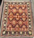 ANATOLIAN - Tapete turco confeccionado à mão em lã sobre algodão tendo vermelha, bege e azul como cores predominantes. Med.: 330x250 cm.