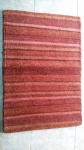Tapete Nepal Rust feito a mão em lã e algodão. Med.: 60x90 cm.