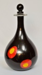 A. Martinelli  (Veneza)  Magnífica Garrafa em cristal de Murano, na tonalidade preta com círculos vermelho / amarelo. Altura 53 x 30 cm. Assinada.