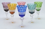 BOHEMIA - Conjunto com seis magníficas taças de coleção multicoloridas em cristal da bohêmia double ricamente lapidado à mão. Med.: 18,5x9,5 cm.