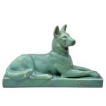 Escultura Art Decó em cerâmica esmaltada e craquelada, representando cachorro, assinada na base, LEMONE, e marcada no fundo. Meds: 37,5 cm x 9,5 cm x 22,5 cm.