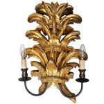 Talha esculpida em único bloco de madeira dourada à folha de ouro brunido, Portugal, século XVIII, adaptada para aplique com duas velas. Meds: 54,0 cm x 37,0 cm