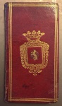 58 - ALMANACH ROYAL, ANNÉ COMMUNE M.DCC.LXXXIX. A PARIS Chez la Veuve D'Houry & Debure, Imp. Lib. de Mgr le  Duc d'Orléans, rue Hautefeuille . Paris, Debure, 1789. Avec Privilege du Roi. Uma crônica das principais notícias da Europa dividida de Janeiro a Dezembro com páginas para anotações sobre perdas e ganhos, algumas manuscritas de época. Encadernação em couro morrocan brasonada com ferros em douração. Med. 11x6 cm. Cod. MMC-2596