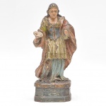 Rara imagem em madeira representando Santa Luzia, rica policromia, Rio de Janeiro, séc. XIX. Med.: 21 cm.