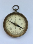 Antiga bússola de bolso em metal prateado, fundo espelhado. Funcionando. (só precisa regular) Med. 4cm