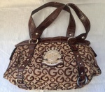 Linda bolsa da marca Guess na cor marrom, interior forrado, perfeito estado. Med. 37x25cm