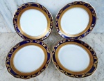 Quatro pratos para bolo/pão em porcelana vitrificada e esmaltada de - Sta CATARINA - com bordas azul cobalto e ouro brunido em alto relevo. Diâmetro 15 cm.