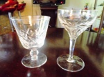 Duas Taças de Cristal para coleção , possivelmente Baccarat , som Límpido , lapidações importantes. Alturas 12 e 9 cm