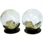 2 (Duas) Bolas em Vidro Craquelado com Base em Metal Patinado em Preto e Dourado. Medida: 10 X 9 cm (Diâmetro)