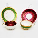 2 xícaras com pires em porcelana alemã da Bavaria e outra ` PIKEN HAMMER` Czechoslovakia