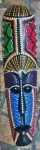 Bela e grande Máscara para decoração de paredes, artesanato feito na Ilha de Lombok, na Indonésia, em madeira entalhada e com pintura a mão medindo 50 cm