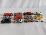 Brinquedo - lote composto de 12 miniaturas de carrinhos, lata, ferro, metal, plástico, acrílico, de modelos diversos, com desgastes; maior aprox. 2,5 x 2,5 x 7cm
