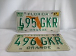 Par placas sequenciais, antigas, americanas, Florida 495 e 496GKR; aprox. 31 x 16cm