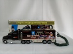 Telefone caminhão NASCAR, funcionando, segue em caixa original; aprox. 9,5 x 7 x 35cm