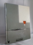 Livro Ilustrativo "Cozinhar c/ microondas, técnicas e receitas BRASTEMP", 122 páginas, apresenta desgastes; aprox. 28 x 21cm