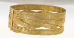 PULSEIRA EM OURO 18K CONTRASTADO. PESO 52.2 GRAMAS MEDINDO 19.5 ABERTA X 2.6CM DE ALTURA