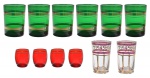 Lote constando de copos em vidro, constando de:  6 copos verdes para wisky  (11 cm) /  4 copos vermelhos para licor ( 5 cm)  /  2 copos dourados (9.5 cm), todos rematados em ouro. Século XX. Pertencente ao espólio de Sérgio Luiz Viotti e Dorival Carper.